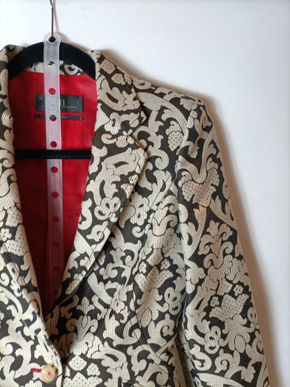 CAROLINA HERRERA. Total blazer and printed skirt look. Size 36