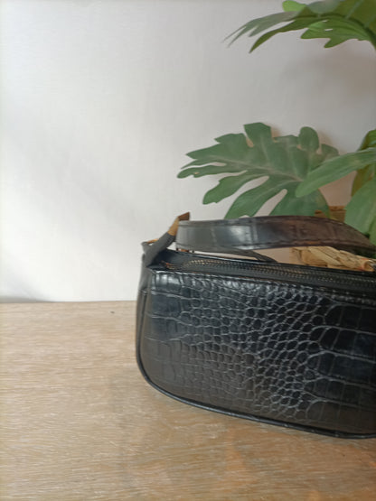 OTHERS. Mini black faux leather bag