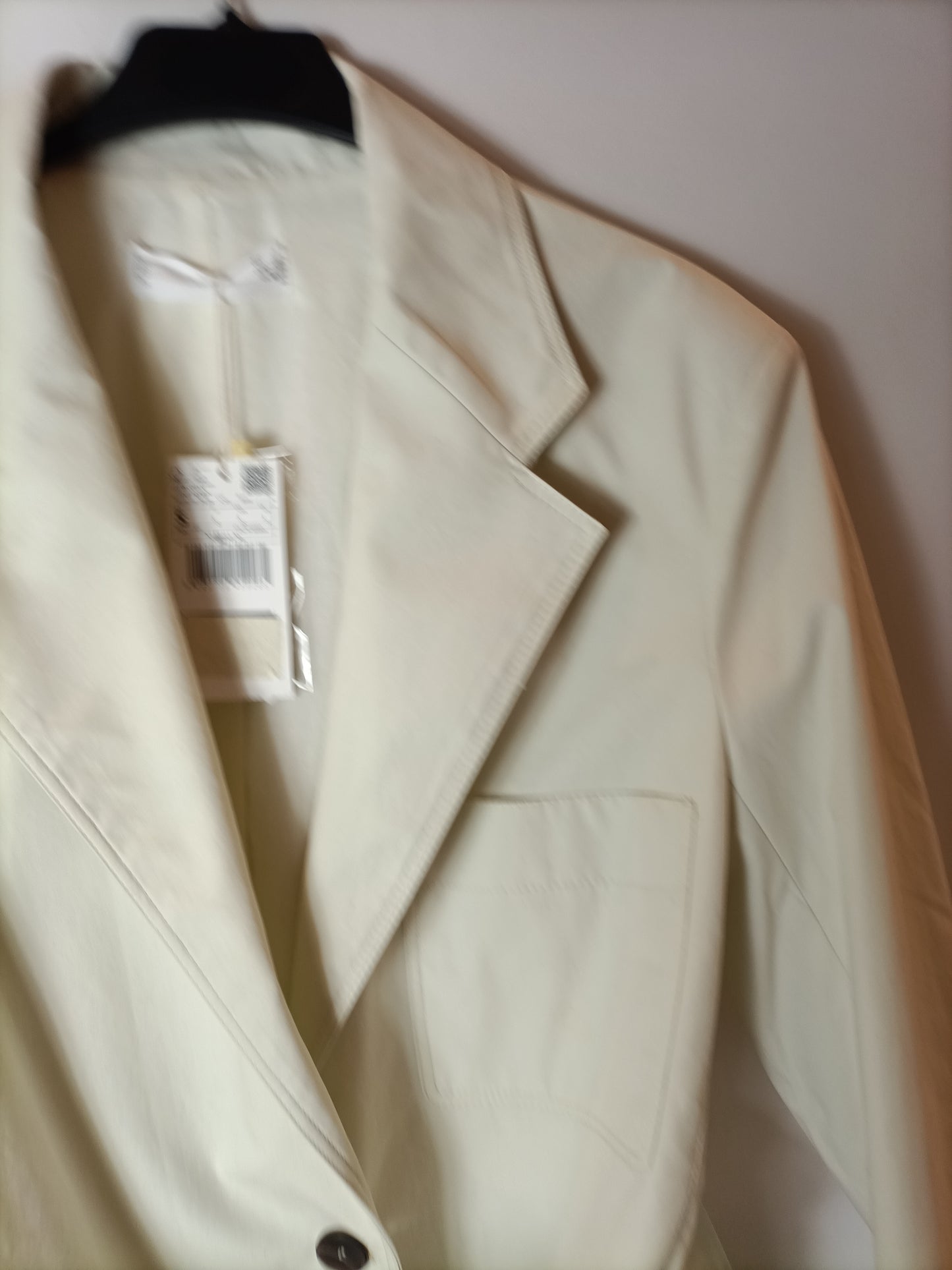 MANGO. Beige jacket with Ts belt