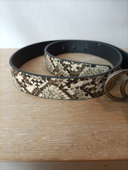 OTRAS. Cinturón animal print