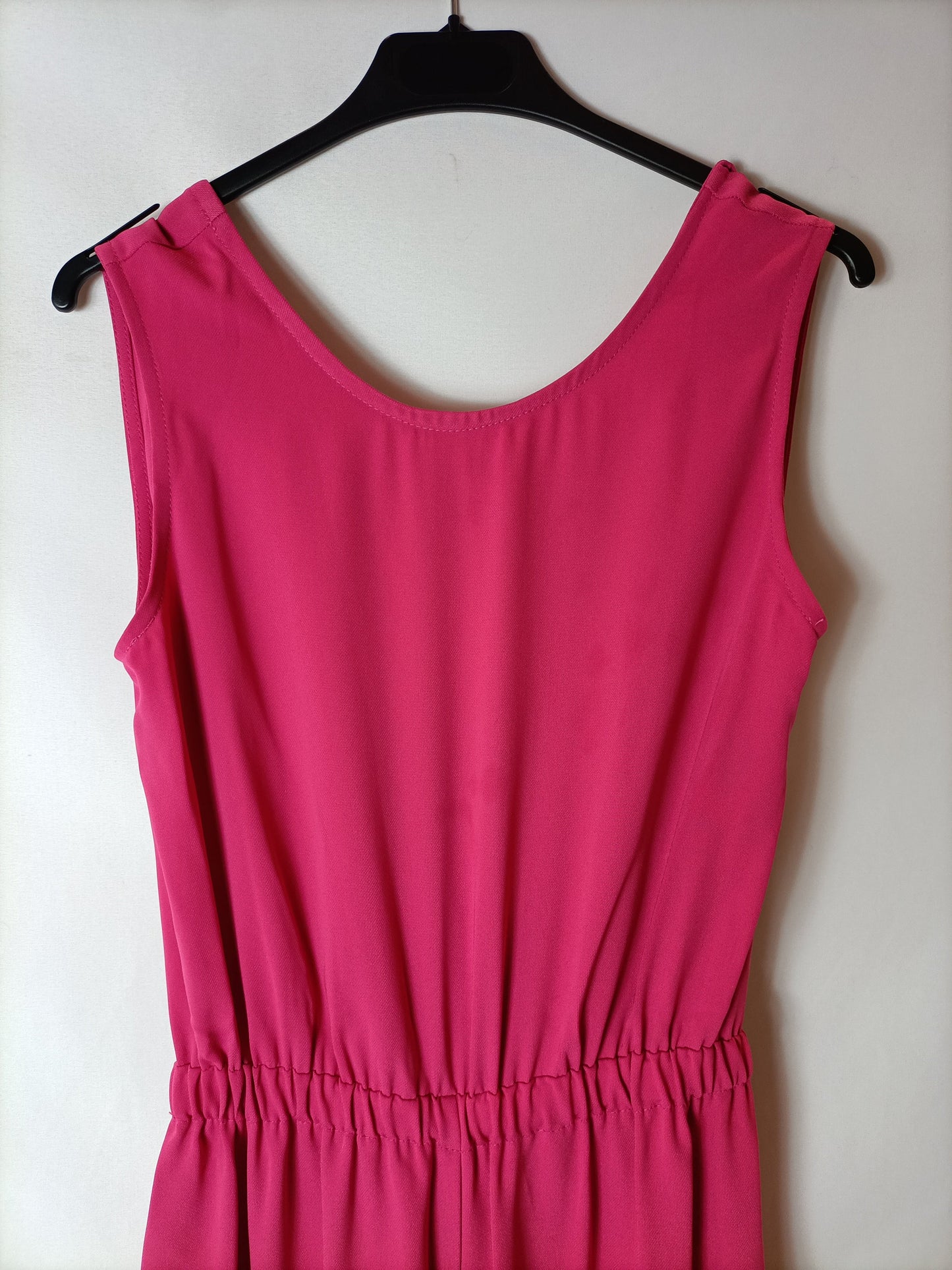 ESTE ES. Mono fluido rosa T.s