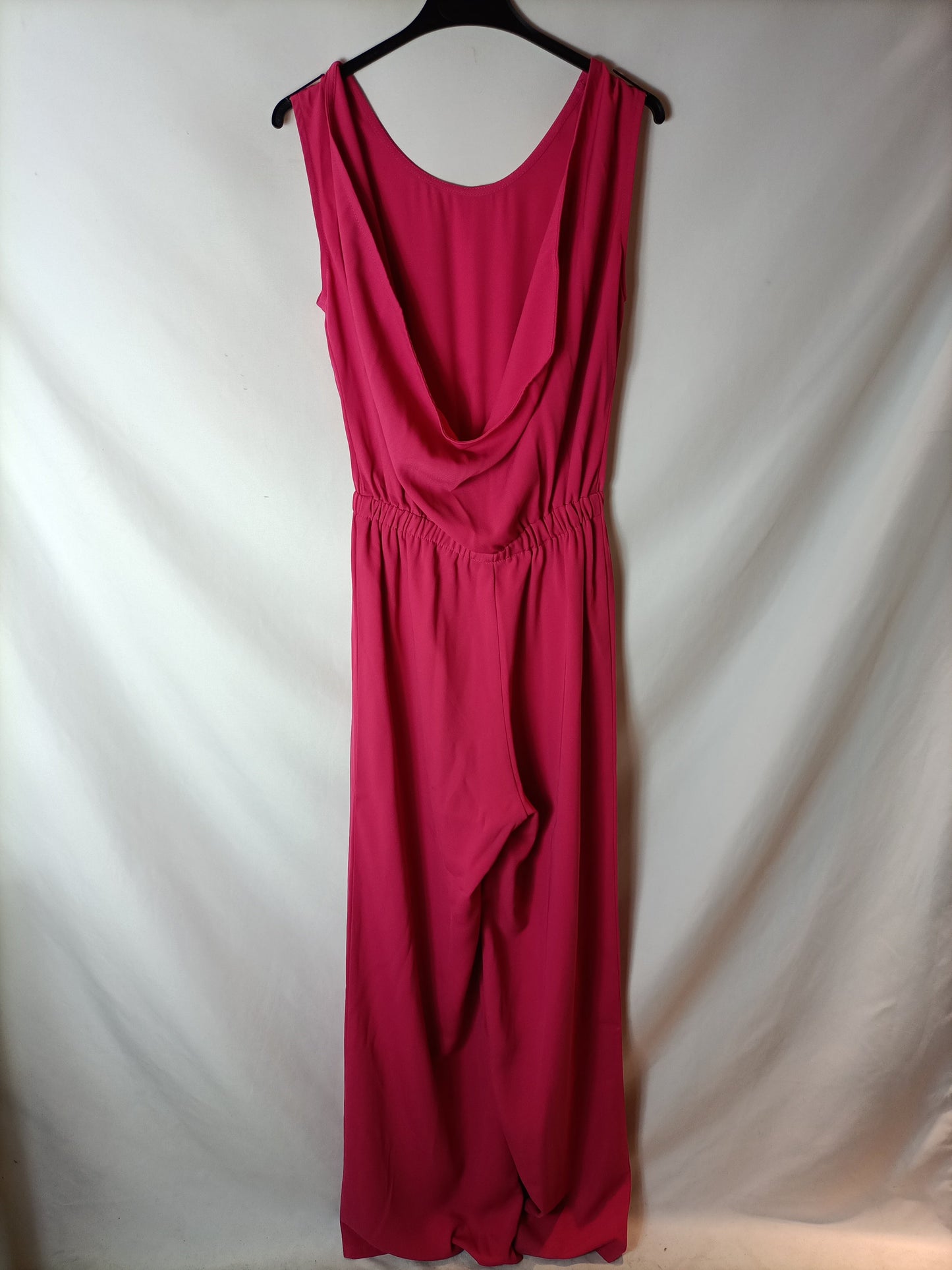 ESTE ES. Mono fluido rosa T.s