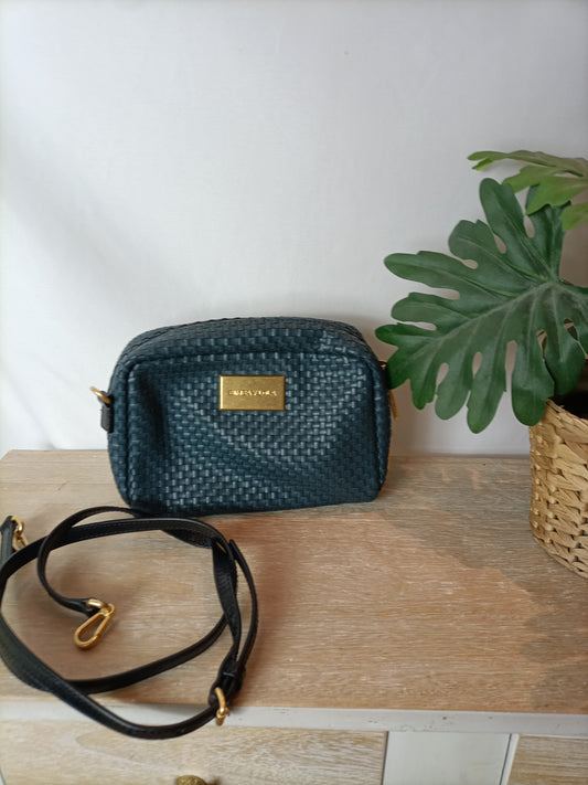 BIMBA Y LOLA. Blue braided bag