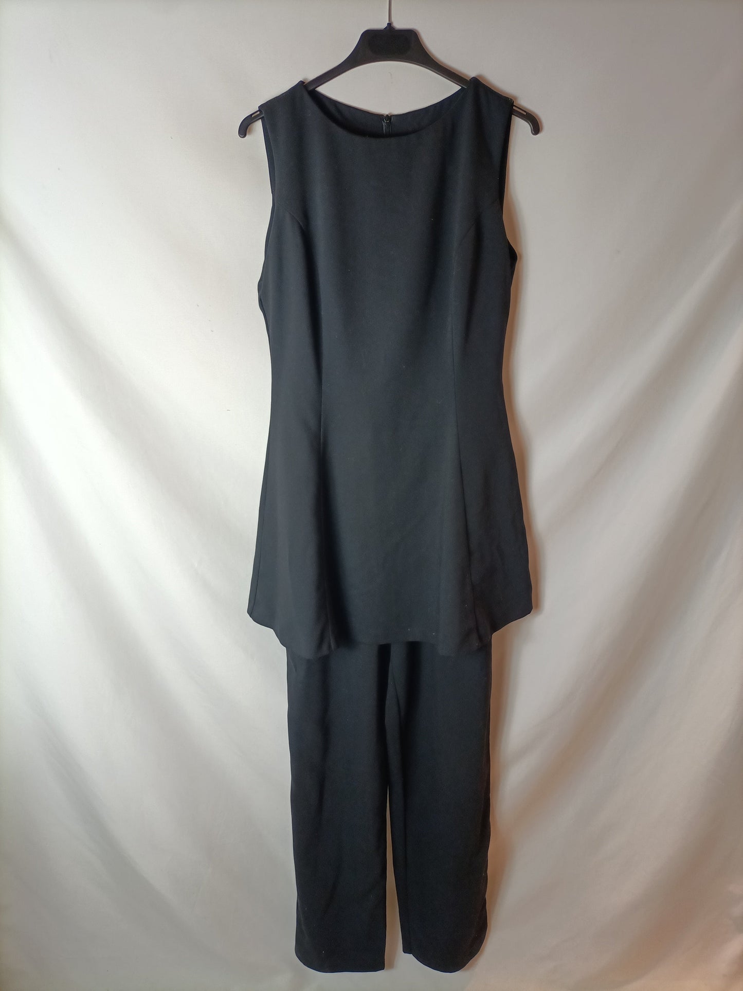 DON ALGODÓN. Black jumpsuit with ruffled top. Size 40