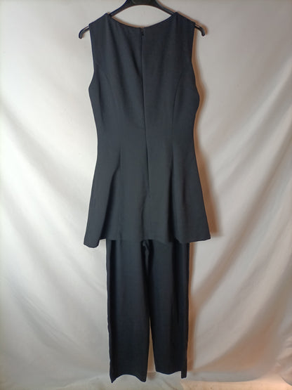 DON ALGODÓN. Black jumpsuit with ruffled top. Size 40