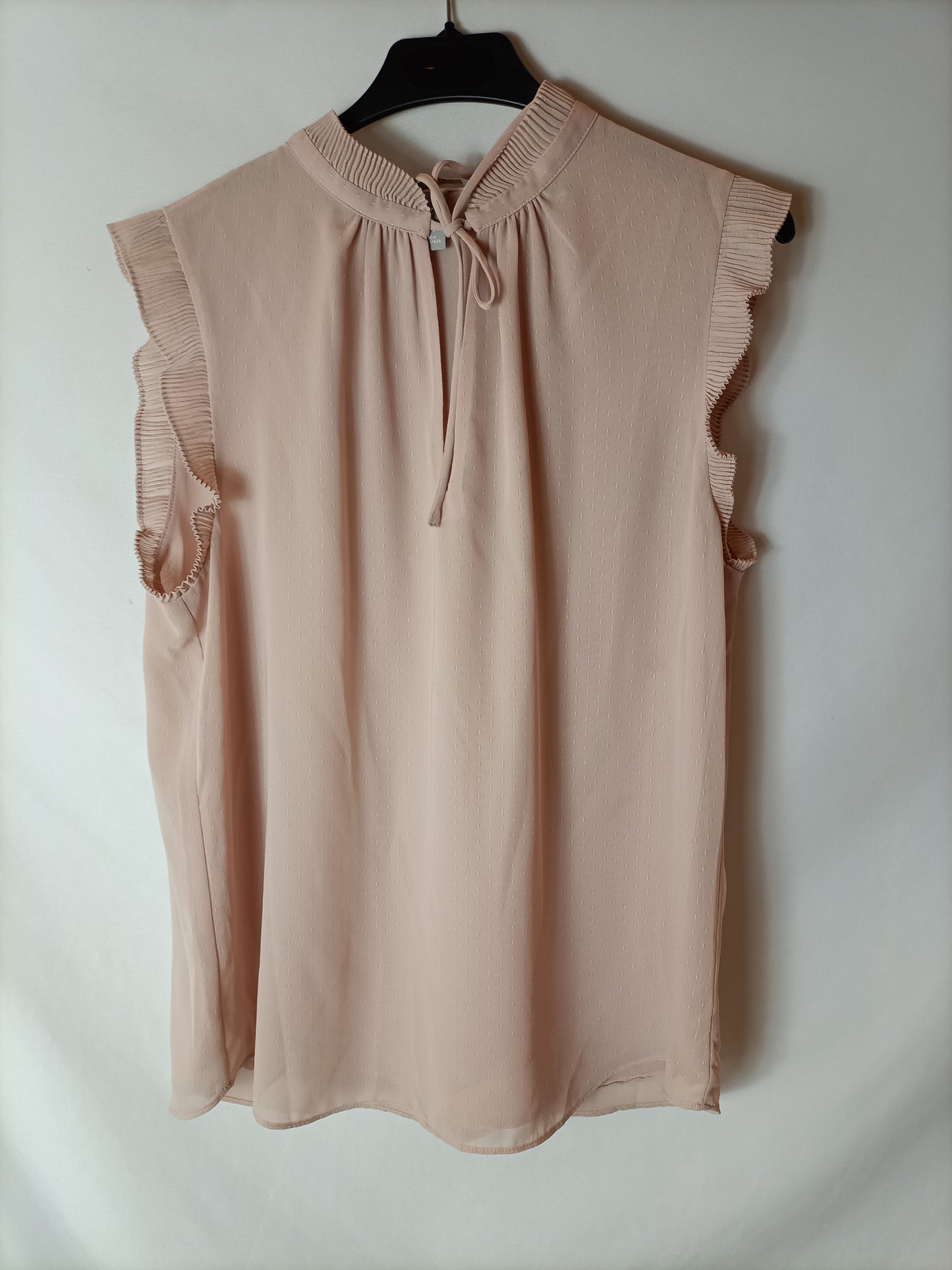 H&M. Blusa rosa plumeti T.40