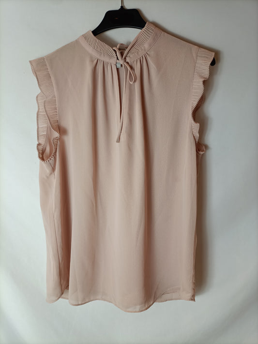 H&M. Blusa rosa plumeti T.40