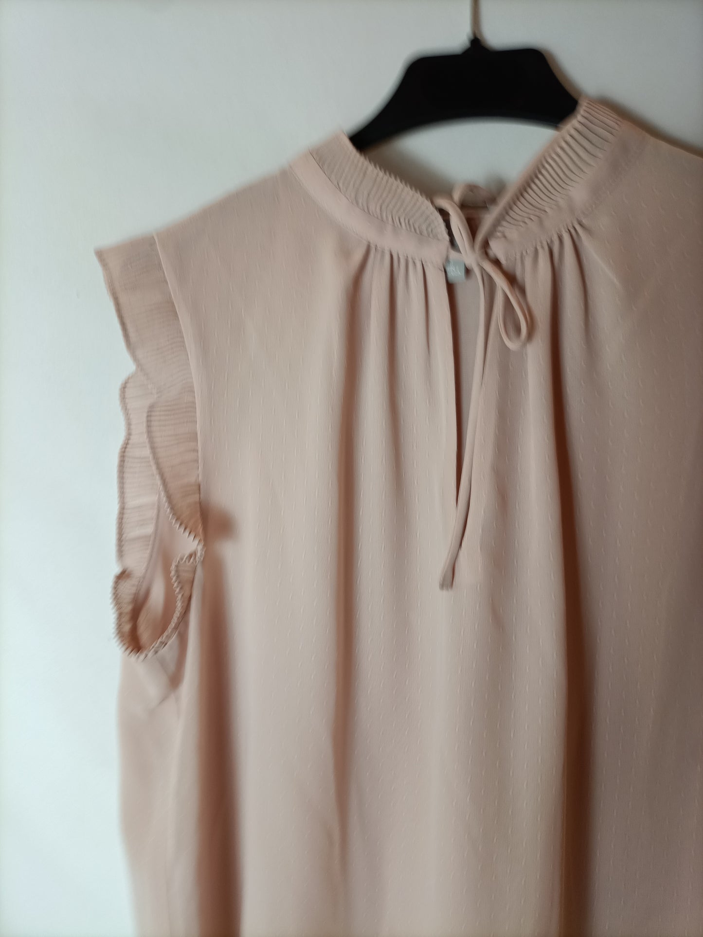 H&M. Blusa rosa plumeti T.40