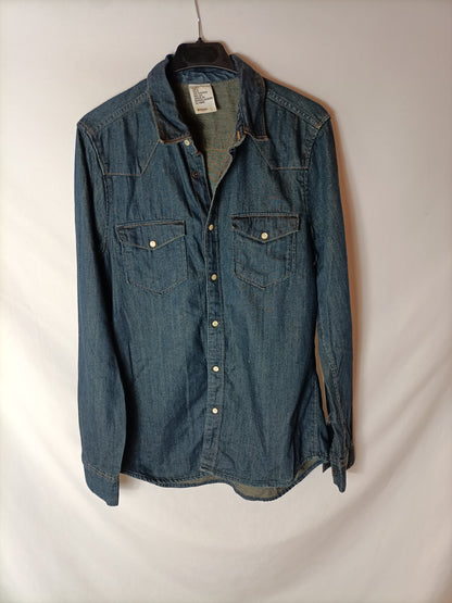 H&amp;M. Over a dark denim shirt. TS