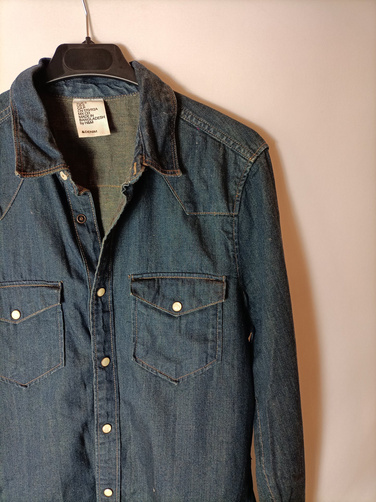 H&amp;M. Over a dark denim shirt. TS