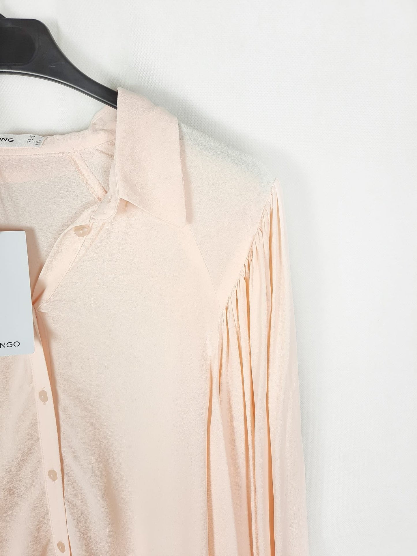 MANGO. Blusa rosa mangas abullonadas T.m