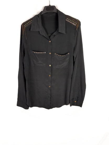 OTRAS. Blusa hombreras estrella T.u