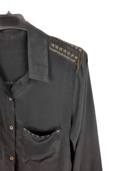 OTRAS. Blusa hombreras estrella T.u