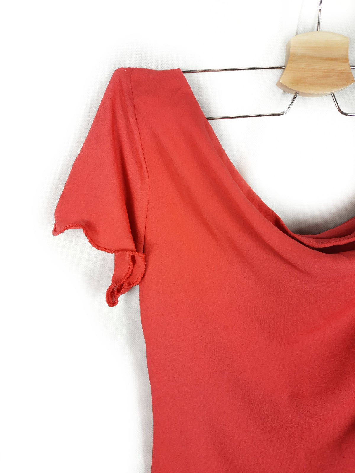 OTRAS. Blusa coral manga asimetrica T.m/l