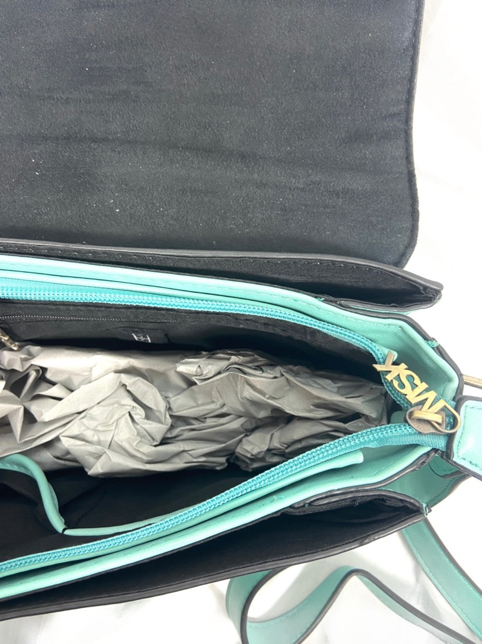 MISAKO. Medium turquoise blue crossbody bag