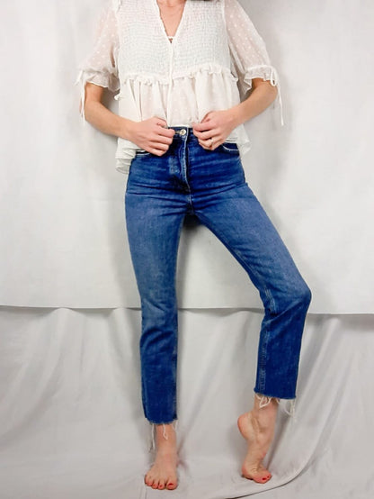 ZARA. Vaquero botones flecos T.32