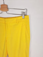 ZARA.Pantalones amarillos vestir T.36