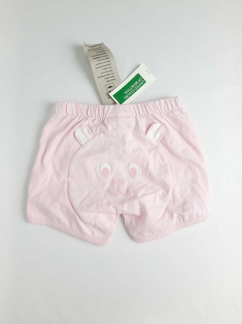 BENETTON. Pantalón rosa conejito T.6-9 meses