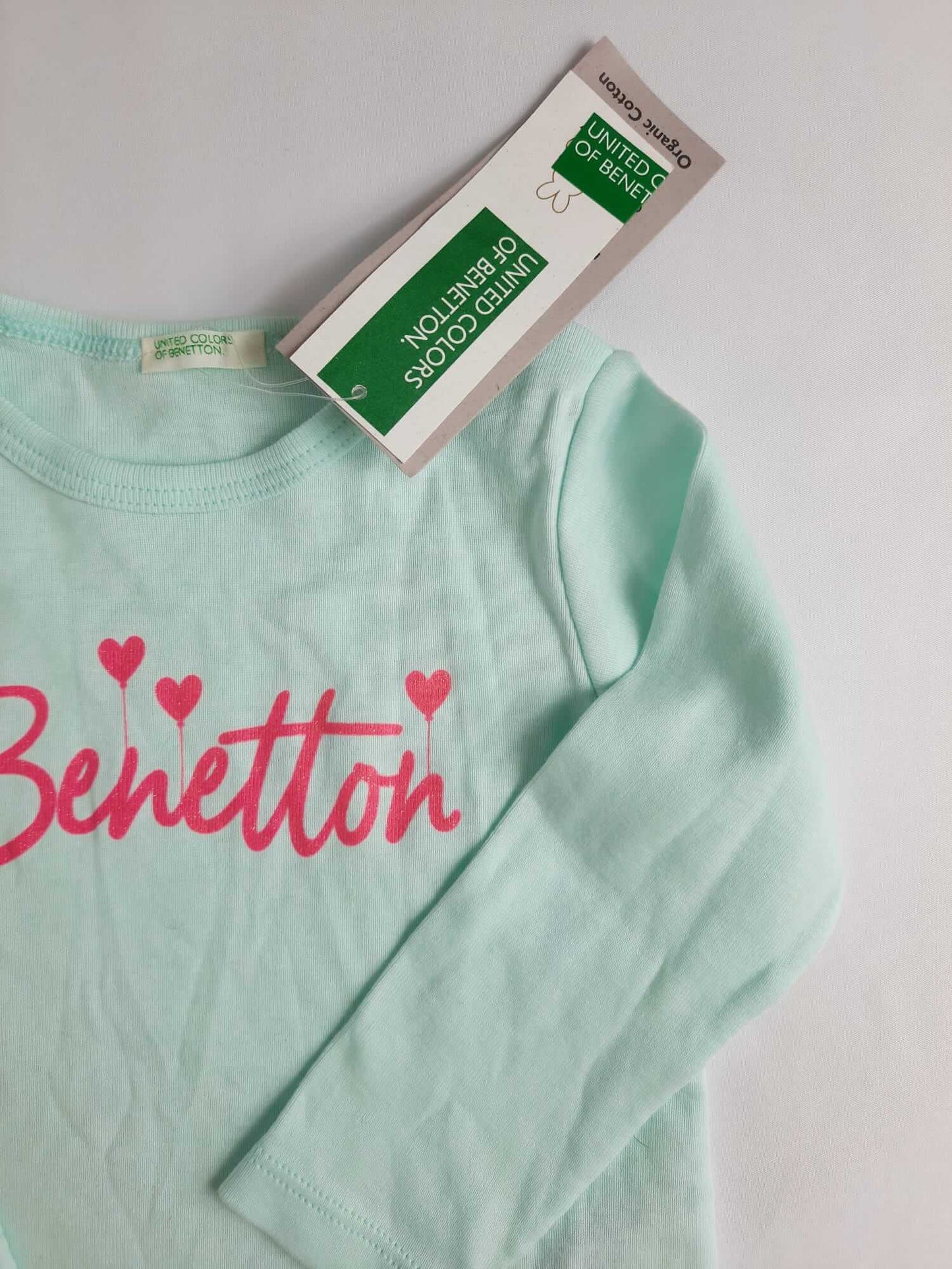 BENETTON. Camiseta verde agua T.9-12 m
