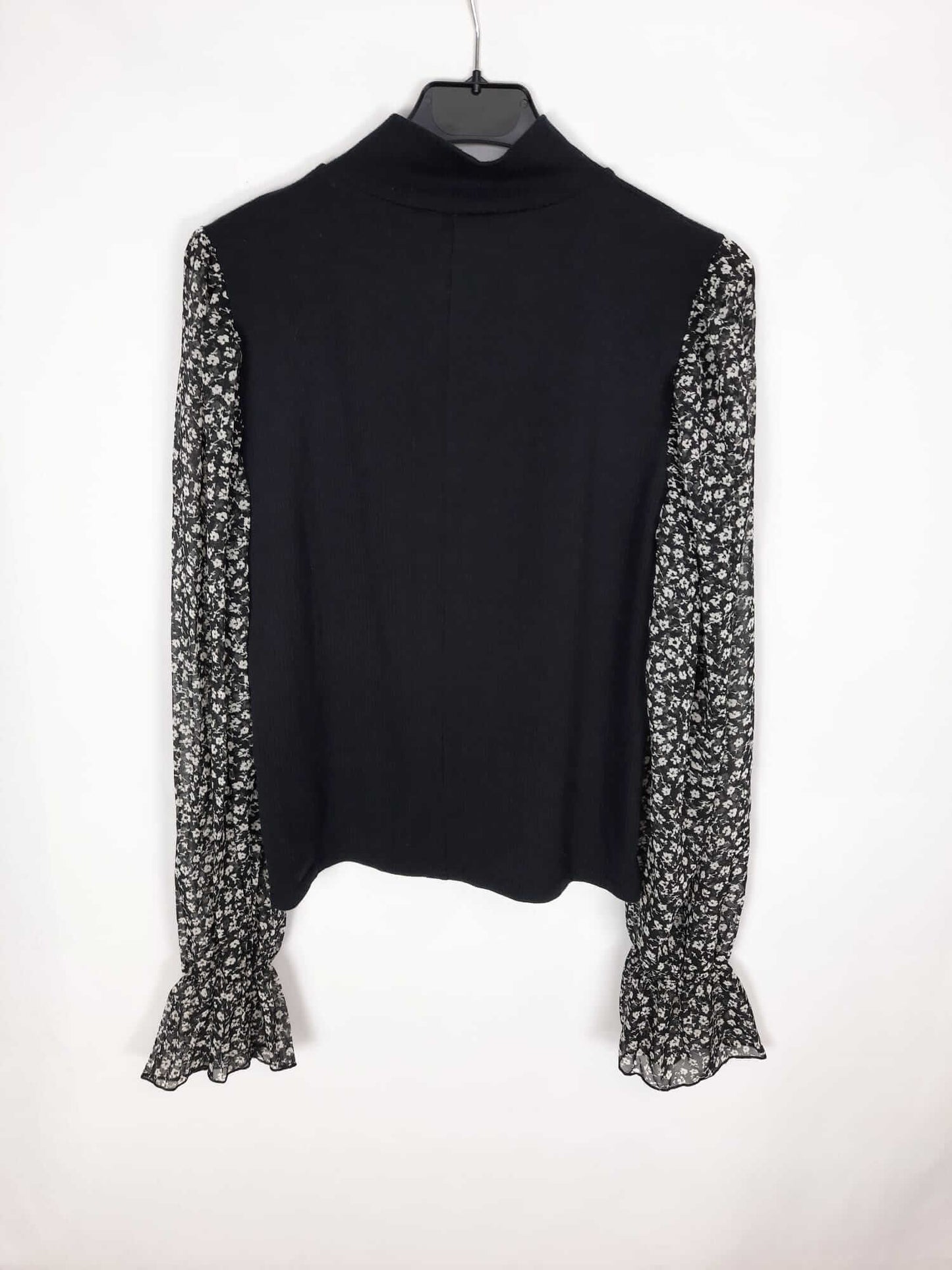 ZARA. Black double-textured sweater/top with floral print sleeves. Size m