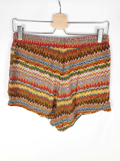 PRIMARK. short etnico tonos rojos T.40