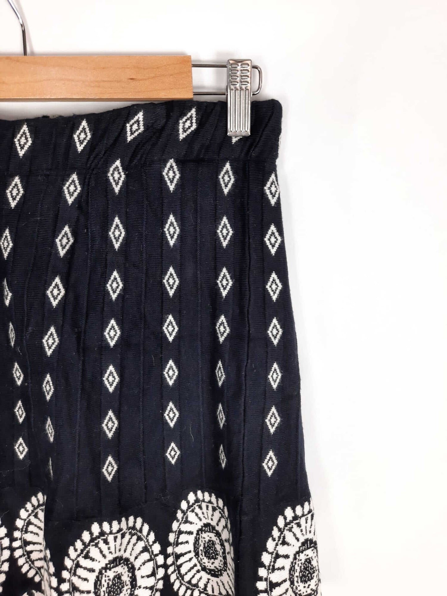 OTRAS.Falda punto azul dibujos T.34/36