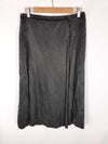 H&M. Falda midi negra con aperturas T. 40