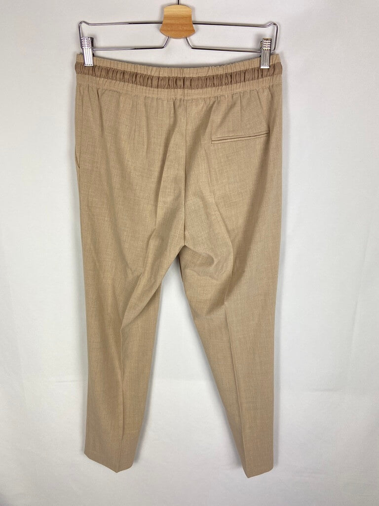ZARA. Pantalon fluido beige T. m