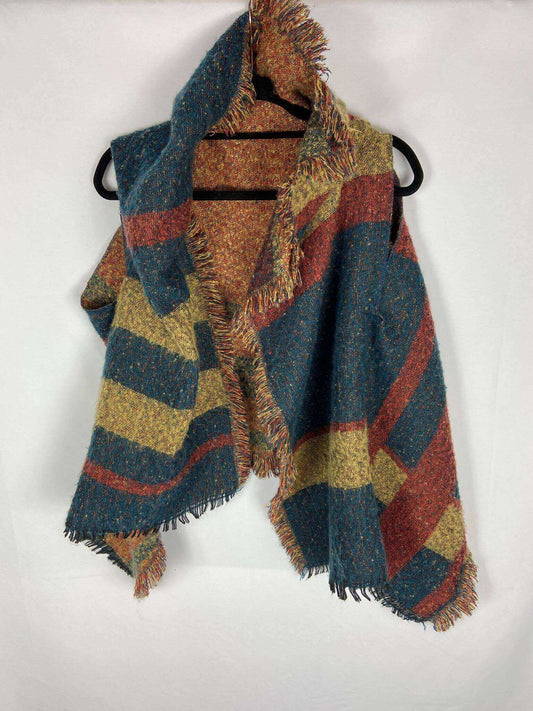 OTRAS. Poncho colores flecos