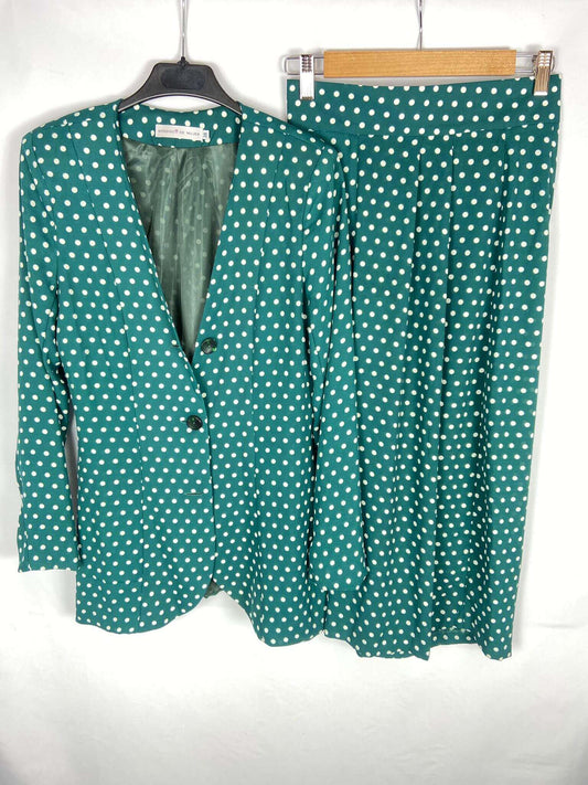 WOMAN'S BITE. Total blazer look and flowing green polka dot pants, size 38.