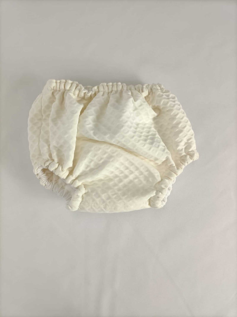 OTRAS.Cubre pañales beige textura T. 0 meses