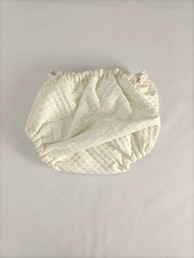 OTRAS.Cubre pañales beige textura T. 0 meses