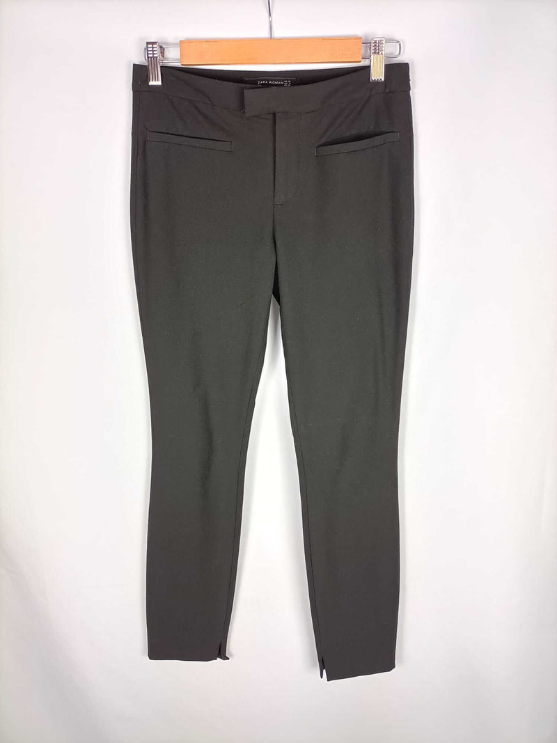 ZARA.Pantalones negros ajustados elásticos T.32