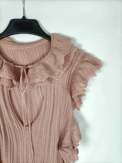 OTRAS. top rosa semitransparente con volantes T. u