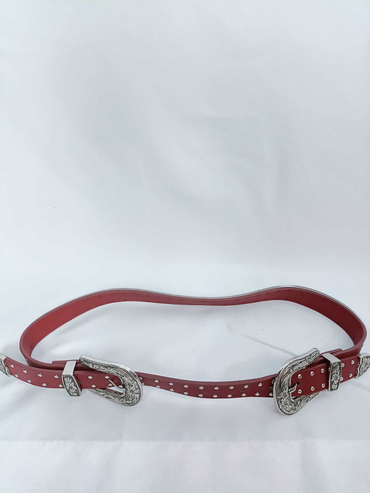 OTRAS. Cinturon burdeos con dos hebillas