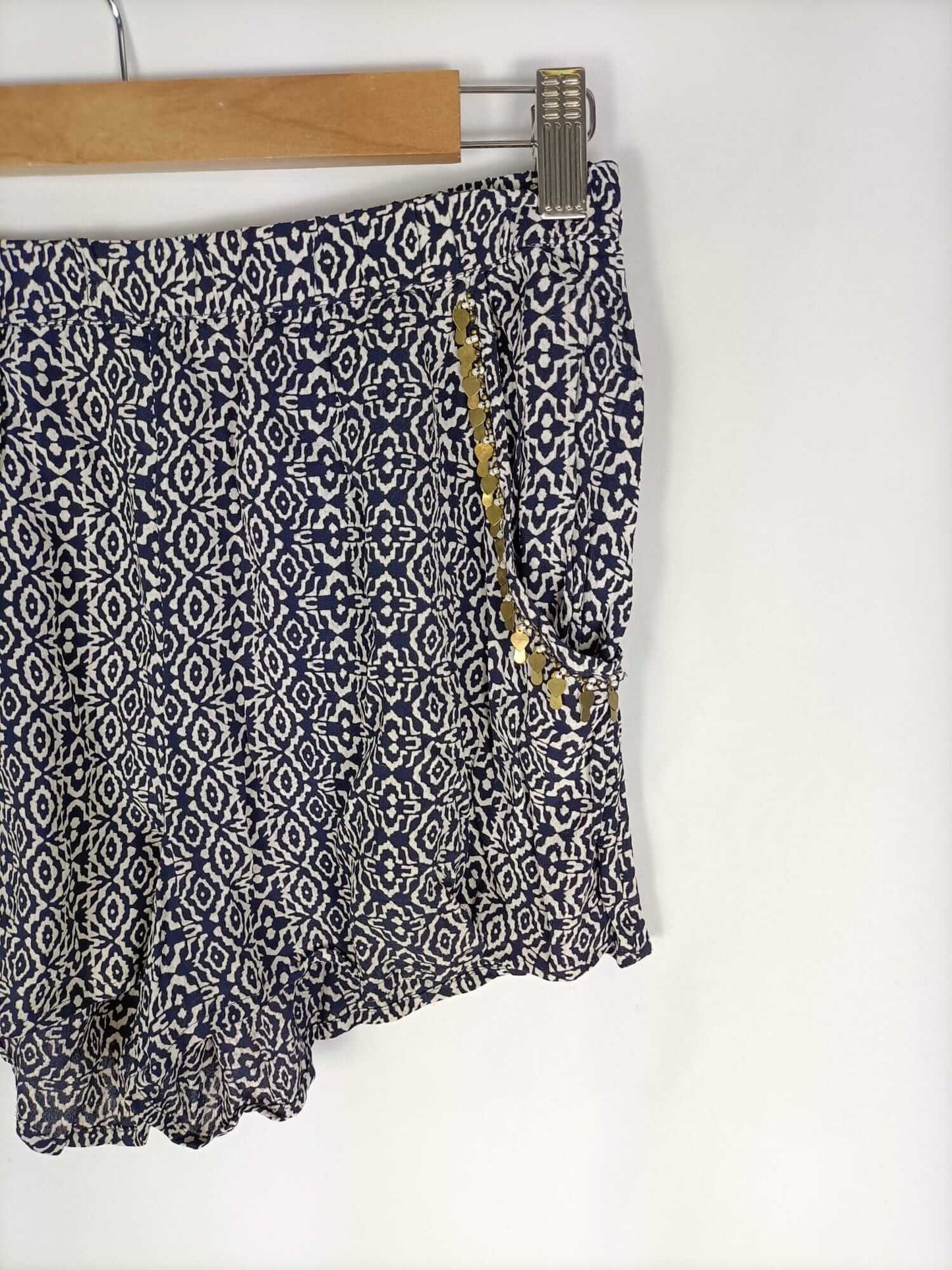 OYSHO.Shorts bolsillos lentejuelas T.m