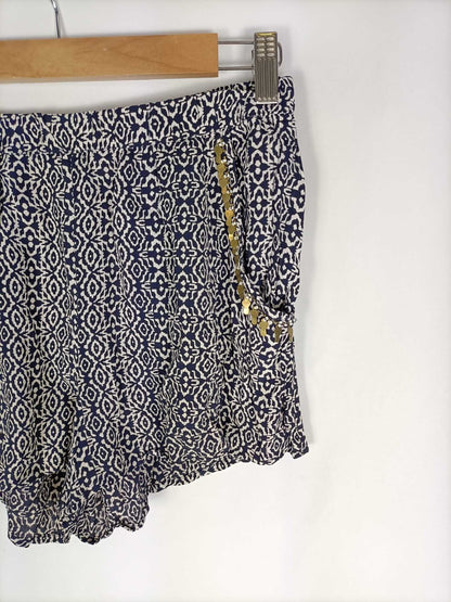 OYSHO.Shorts bolsillos lentejuelas T.m