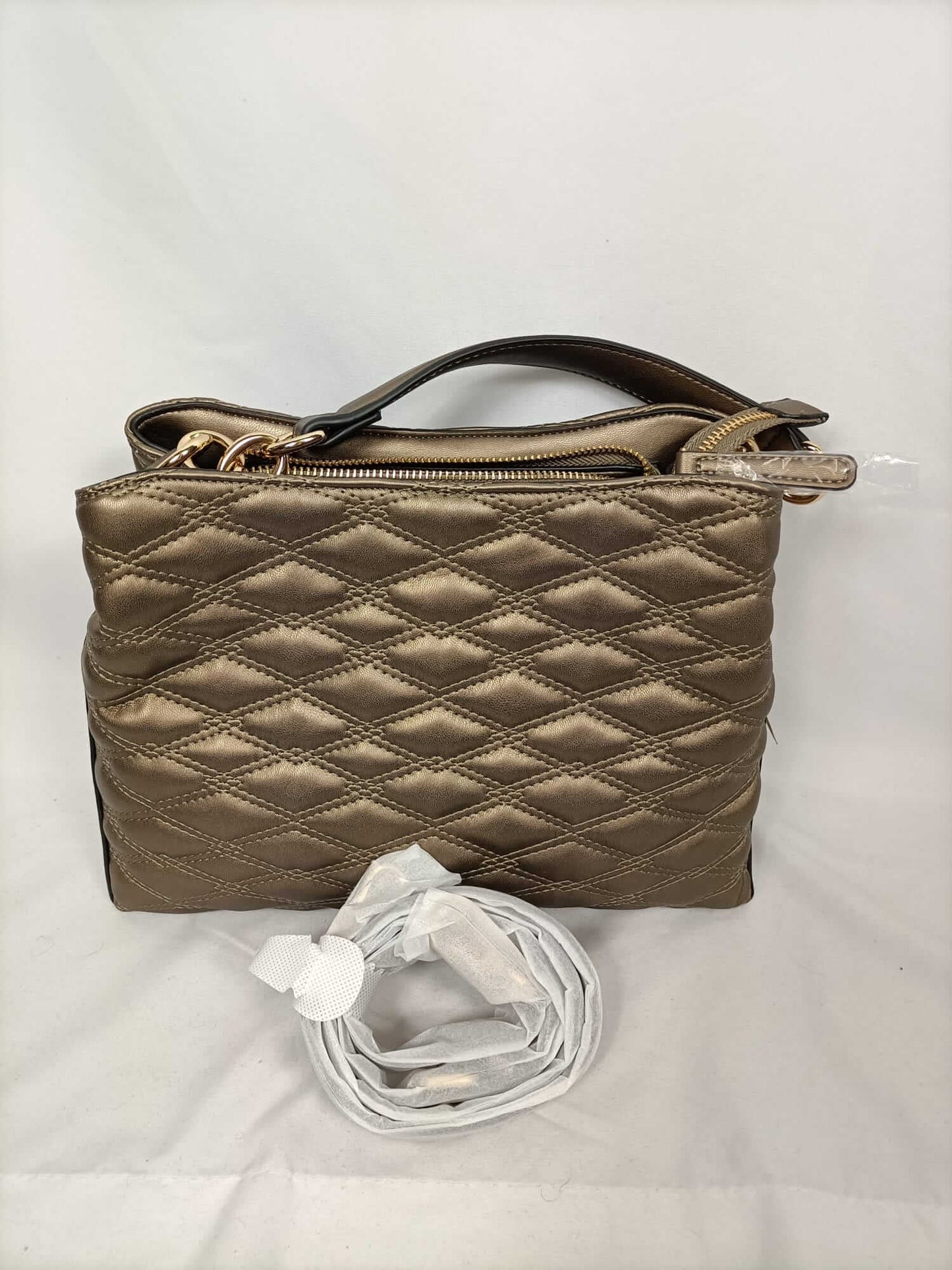 ECI. Quilted bronze bag