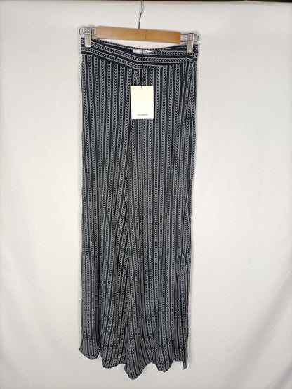 PULL & BEAR. Pantalones anchos T.s