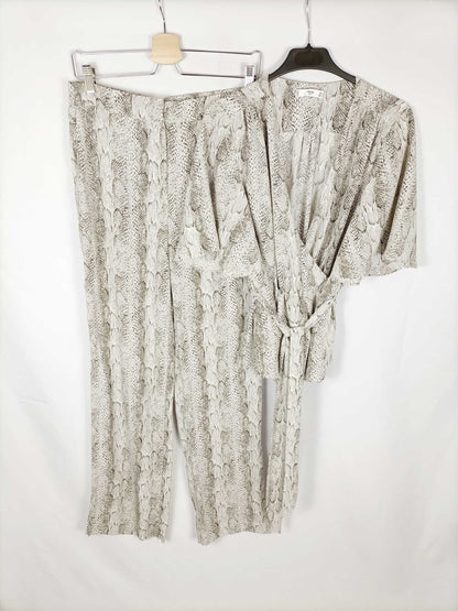 MANGO.Pantalones fluidos animal print T.388