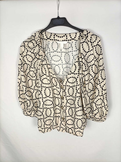 H&M. Blusa beige lunares en cadena T.36