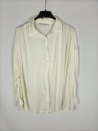 UTERQÜE. Blusa beige oversized T.s