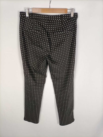 MANGO.Pantalón negro lunares blancos T.40