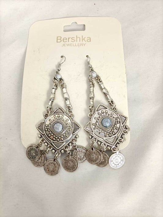 BERHSKA.Pendientes plateados monedas