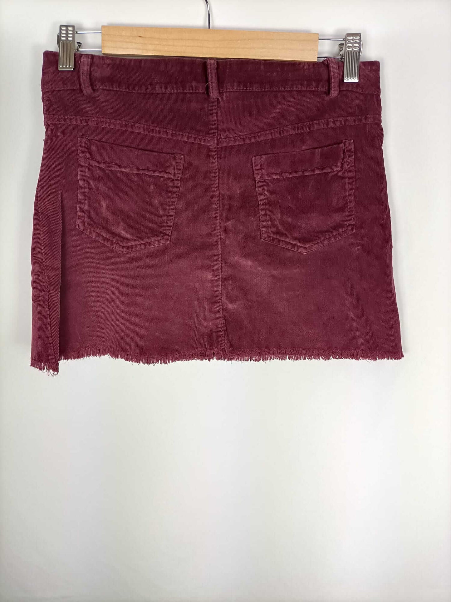 OTRAS.Falda corta burdeos pana T.36