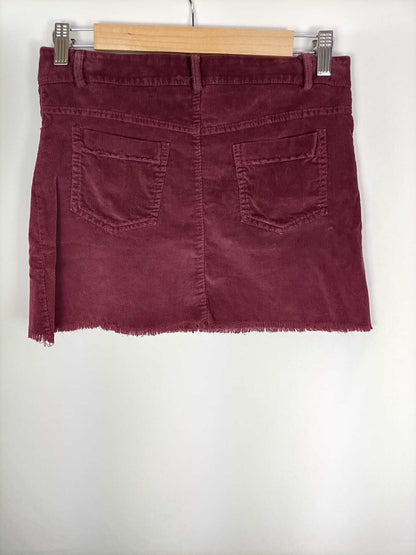 OTRAS.Falda corta burdeos pana T.36