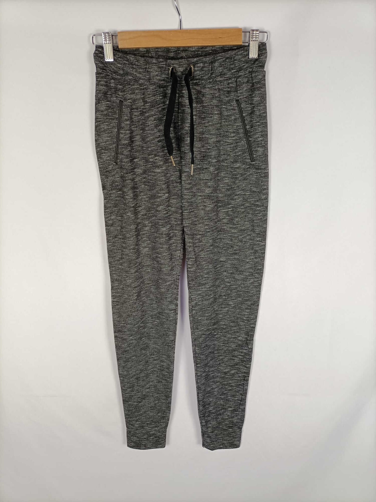 BERSHKA.Pantalones elásticos grises T.s