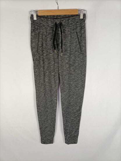 BERSHKA.Pantalones elásticos grises T.s