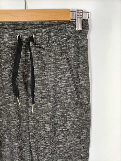 BERSHKA.Pantalones elásticos grises T.s