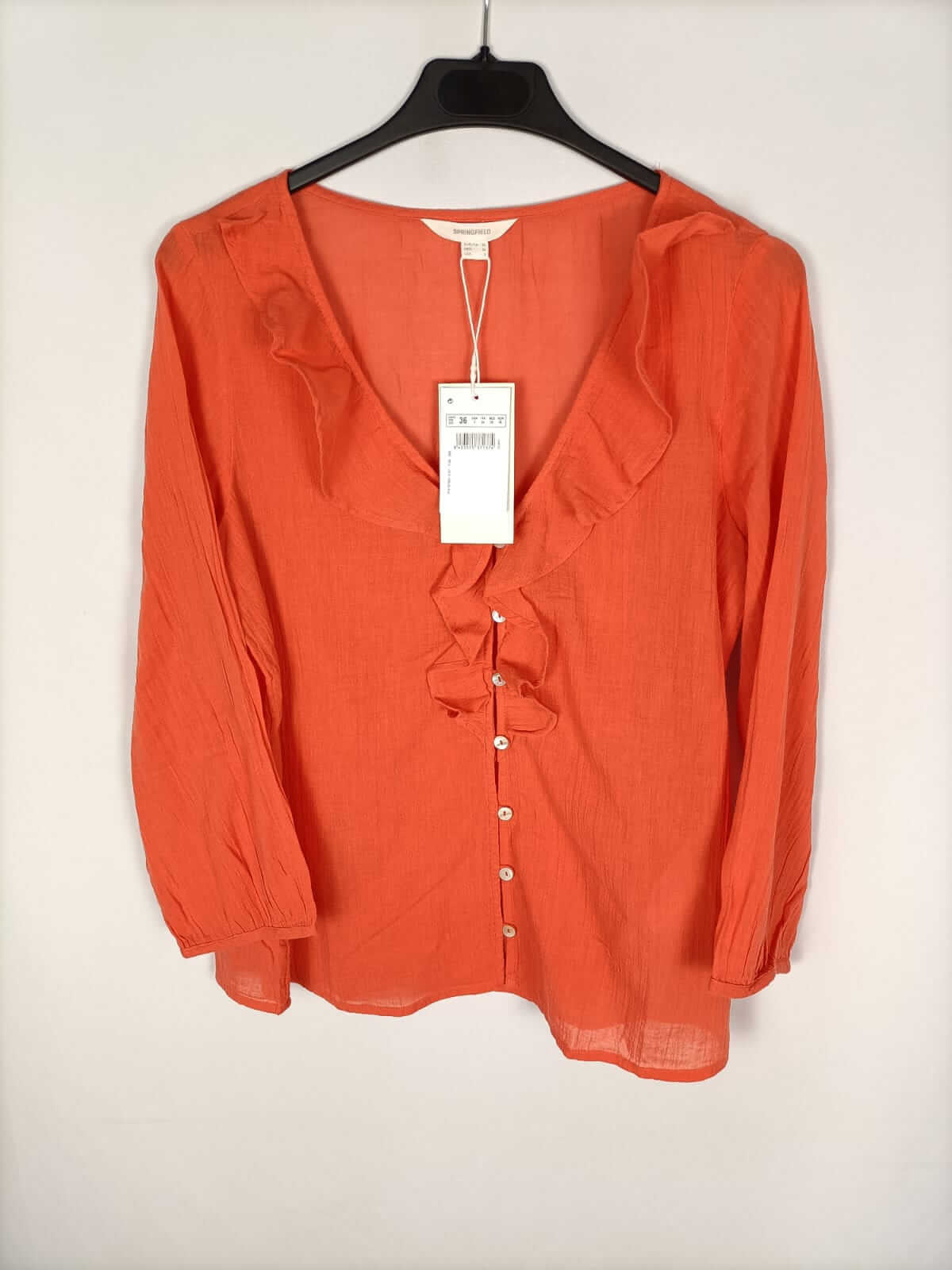 SPRINGFIELD. Orange blouse with ruffles S.36